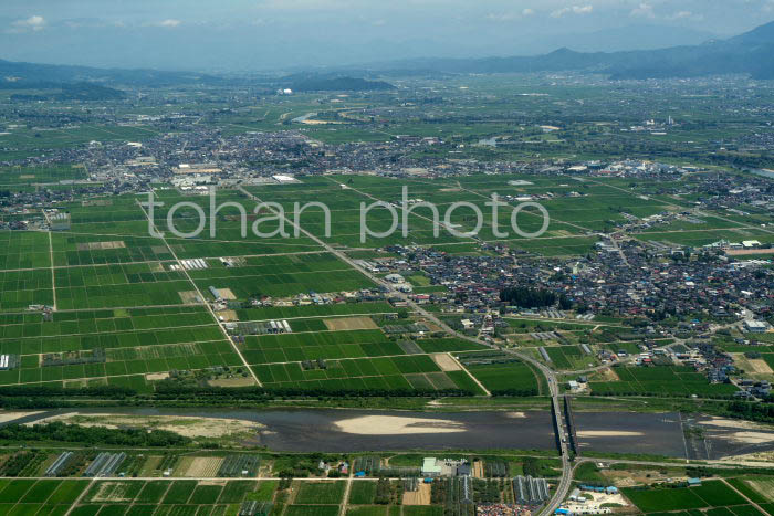 山形盆地(手前寒河江川より西村山郡河北町方面)(2023728)